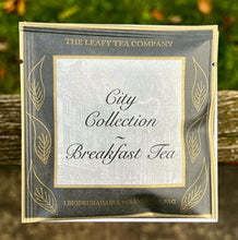 Load image into Gallery viewer, The City Collection Envelopes are black and gold for a touch of luxury. Each containing 1x biodegradable pyramid tea bag and in the box you get 4x different blends to try
